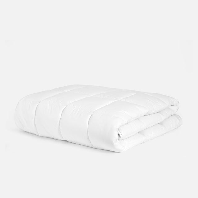 Surmatelas — garnissage synthétique
