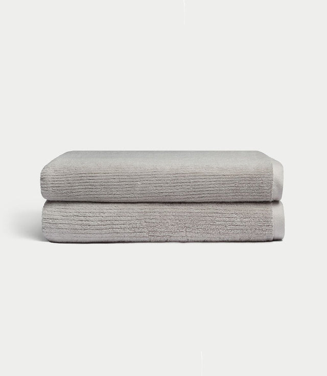 Draps de bain en éponge côtelée