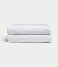 Draps de bain en éponge côtelée