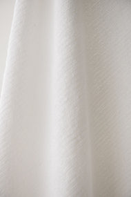 Draps de bain en éponge côtelée